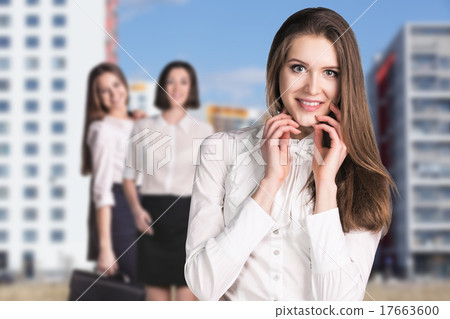 Business women stand on the street  17663600