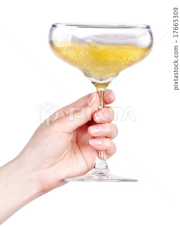 Hand with glass of champagne isolated on a white  17665309