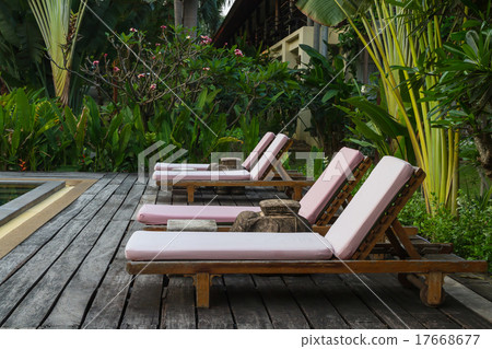 Chairs on a pool deck Chairs on a pool deck 17668677