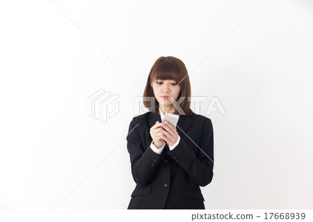 Smartphone business woman staring smartphone concentration Smartphone business woman staring smartphone concentration 17668939