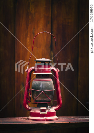 Hammer on wooden bench and wooden background 17669946