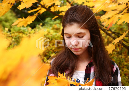 teen girl portrait on the autumn fall background teen girl portrait on the autumn fall background 17670293