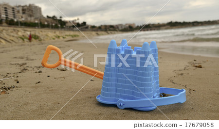 abandoned toy shovel and bucket on the beach abandoned toy shovel and bucket on the beach 17679058