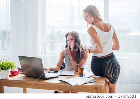 Stock Photo: Office coffee break. Businesswoman showing