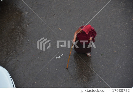 Buddhist Holy Land of Indian Buddhism Buddhist monk walking in the rain 17680722