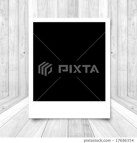 Blank photo frame on big White wood plank 17686354
