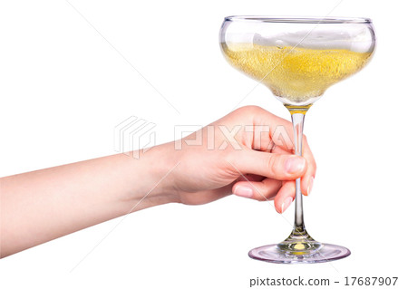 Hand with glass of champagne isolated on a white Hand with glass of champagne isolated on a white 17687907
