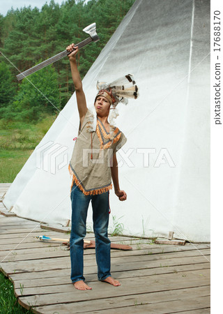 funny boy with native american costume and weapon funny boy with native american costume and weapon 17688170