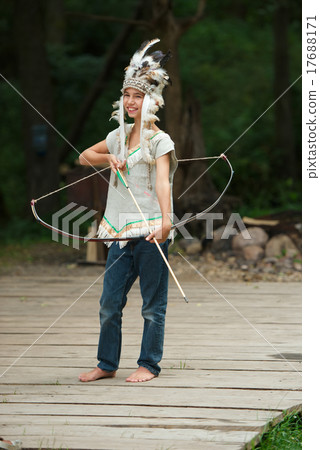 funny boy with native american costume and weapon funny boy with native american costume and weapon 17688171