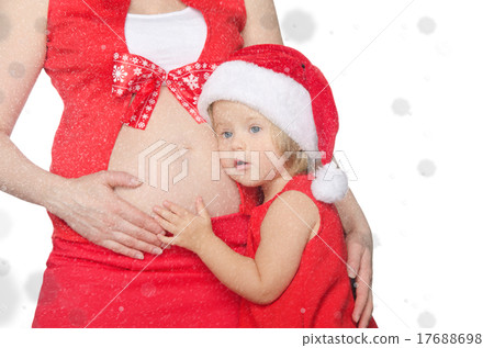 childbelly of pregnant woman at Christmas, snow 17688698