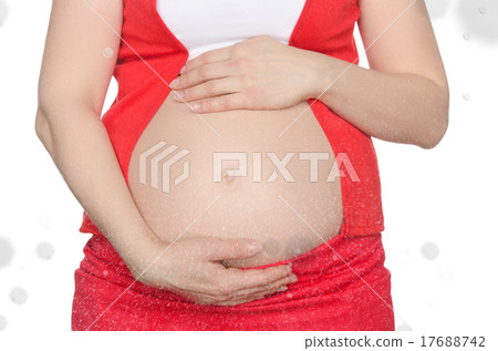 abdomen of pregnant woman with falling snow 17688742