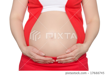 Pregnant woman supports belly 17688745