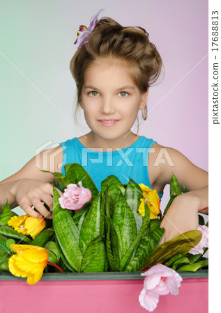 happy girl is caring for flowers 17688813