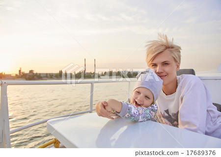 Mother, daughter on yacht or catamaran boat 17689376