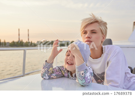 Mother, daughter on yacht or catamaran boat 17689378