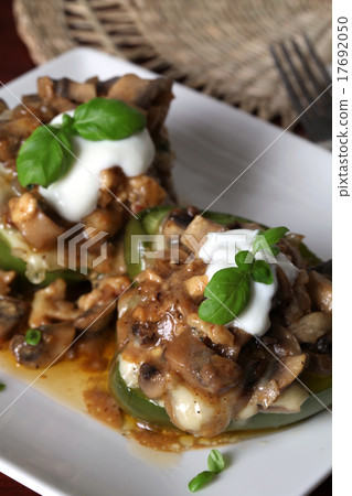 Baked stuffed peppers with mushrooms and cheese 17692050