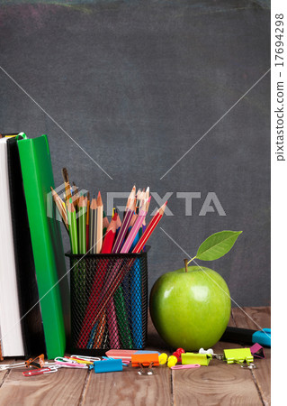 School and office supplies on classroom table School and office supplies on classroom table 17694298