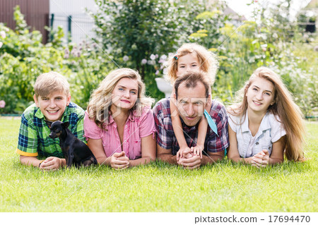 Happy family having weekend in summer park 17694470