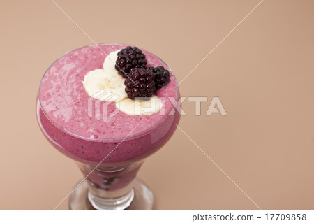 Milk shake with banana and blackberries. 17709858