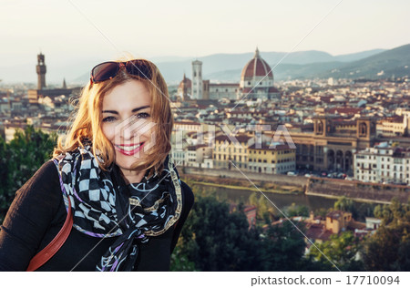 Beautiful woman with view of the city Florence from Piazzale Mic Beautiful woman with view of the city Florence from Piazzale Mic 17710094