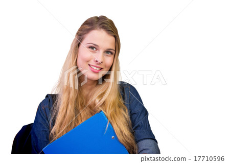 Composite image of pretty student in the library Composite image of pretty student in the library 17710596