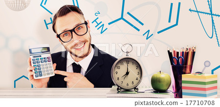 Composite image of geeky businessman pointing to calculator Composite image of geeky businessman pointing to calculator 17710708