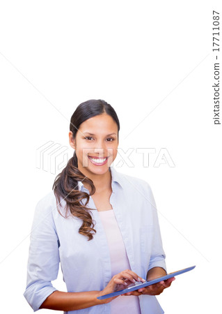 Composite image of woman using tablet pc Composite image of woman using tablet pc 17711087