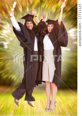 Composite image of full length of two women celebrating in the a Composite image of full length of two women celebrating in the a 17711125