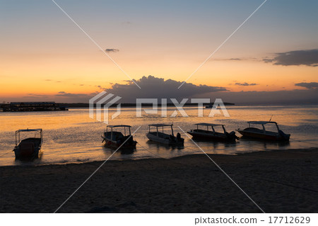 Bali beach with dramatic sky and sunset Bali beach with dramatic sky and sunset 17712629