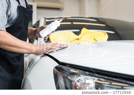 Car polishing series : Worker polishing white car Car polishing series : Worker polishing white car 17712938