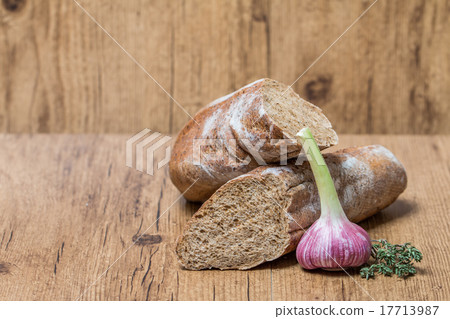 fresh bread baguette with garlic  and herbs 17713987