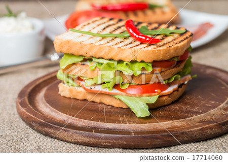 Classic club sandwich with bacon and vegetables 17714060