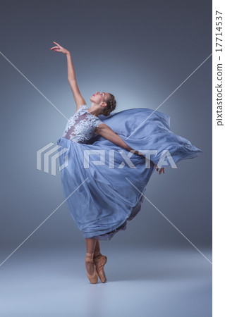 The beautiful ballerina dancing in blue long dress 17714537