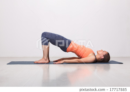 Beautiful sporty fit yogi girl practices yoga 17717885
