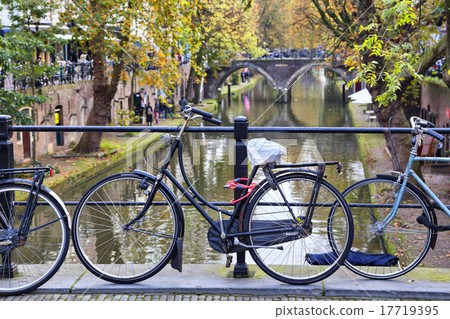 Bicycle tied to the fence of the bridge in Utrecht Bicycle tied to the fence of the bridge in Utrecht 17719395