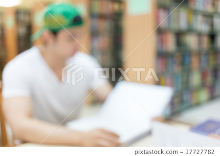library blur background with student and bookshelf library blur background with student and bookshelf 17727782