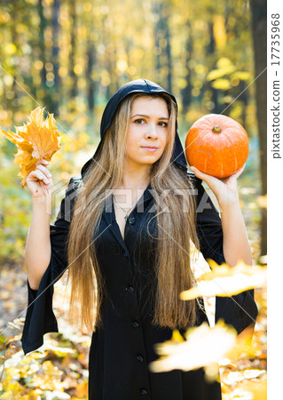 portrait of beautiful blond young woman holding portrait of beautiful blond young woman holding 17735968