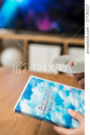 Hands playing video games Hands playing video games 17736327