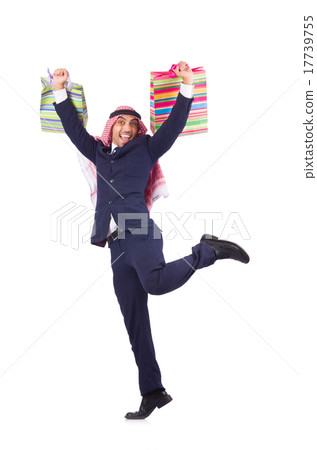 Arab man with shopping gifts on white Arab man with shopping gifts on white 17739755