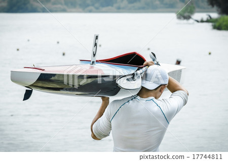 Young athlete in a kayak 17744811