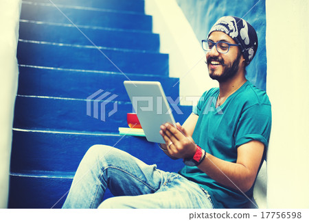 Sikh Guy Browsing Tablet Stair Case Concept 17756598