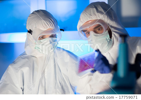 close up of scientists making test in chemical lab 17759071