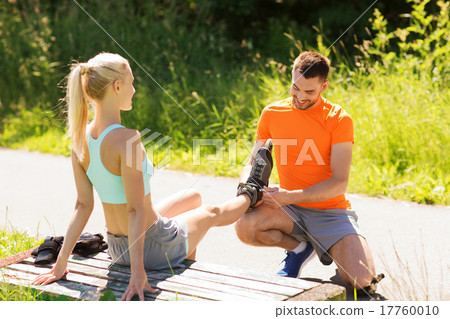 happy couple with roller skates outdoors happy couple with roller skates outdoors 17760010