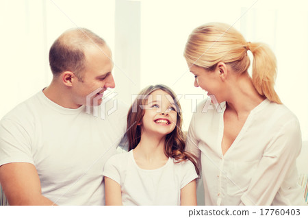 smiling parents and little girl at home smiling parents and little girl at home 17760403