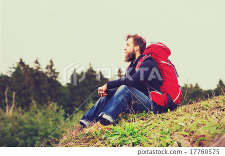 man with backpack hiking 17760575