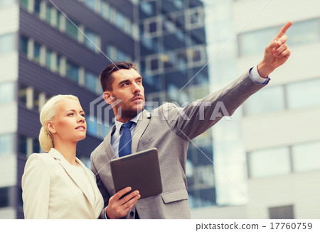serious businessmen with tablet pc outdoors 17760759
