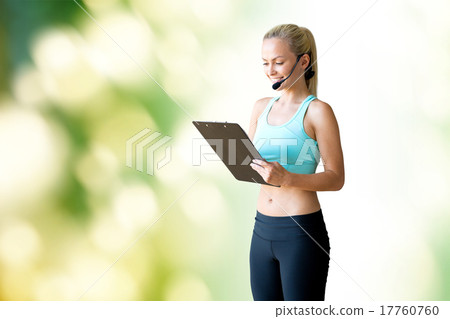happy woman trainer with microphone and clipboard happy woman trainer with microphone and clipboard 17760760