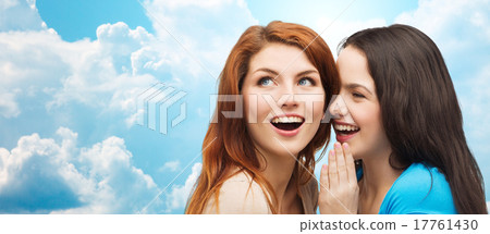 teenage girls or women whispering gossip 17761430