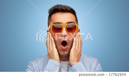 face of scared man in shirt and sunglasses face of scared man in shirt and sunglasses 17762954