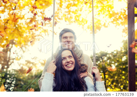 smiling couple hugging in autumn park 17763139